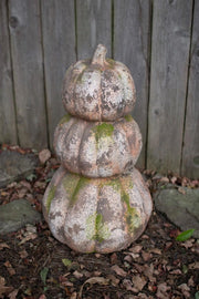 THREE STACKED FAUX CONCRETE PUMPKINS