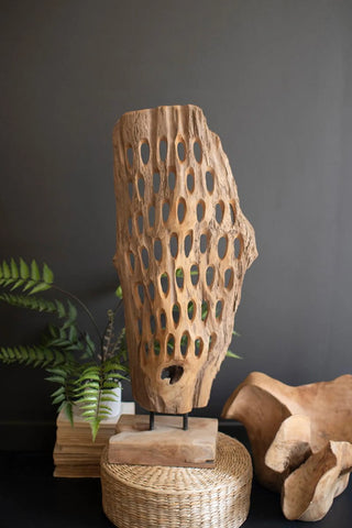 CARVED TEAK WOOD SCUPLTURE ON A BASE - PERFORATED