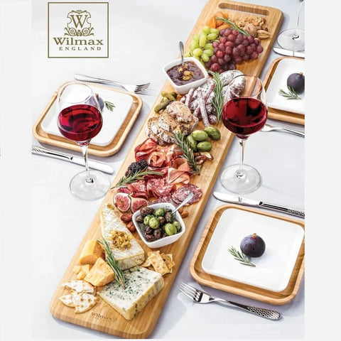 Large feast Charcuterie plating set including long bamboo serving tray and square bamboo platters with fine porcelain plates to match