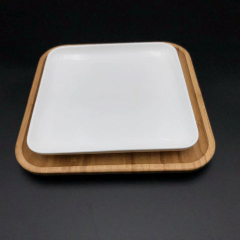 Large feast Charcuterie plating set including long bamboo serving tray and square bamboo platters with fine porcelain plates to match