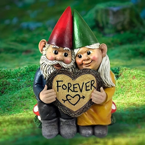 Garden gnome couple statue holding a heart with the word 'Forever', perfect for garden decoration.
